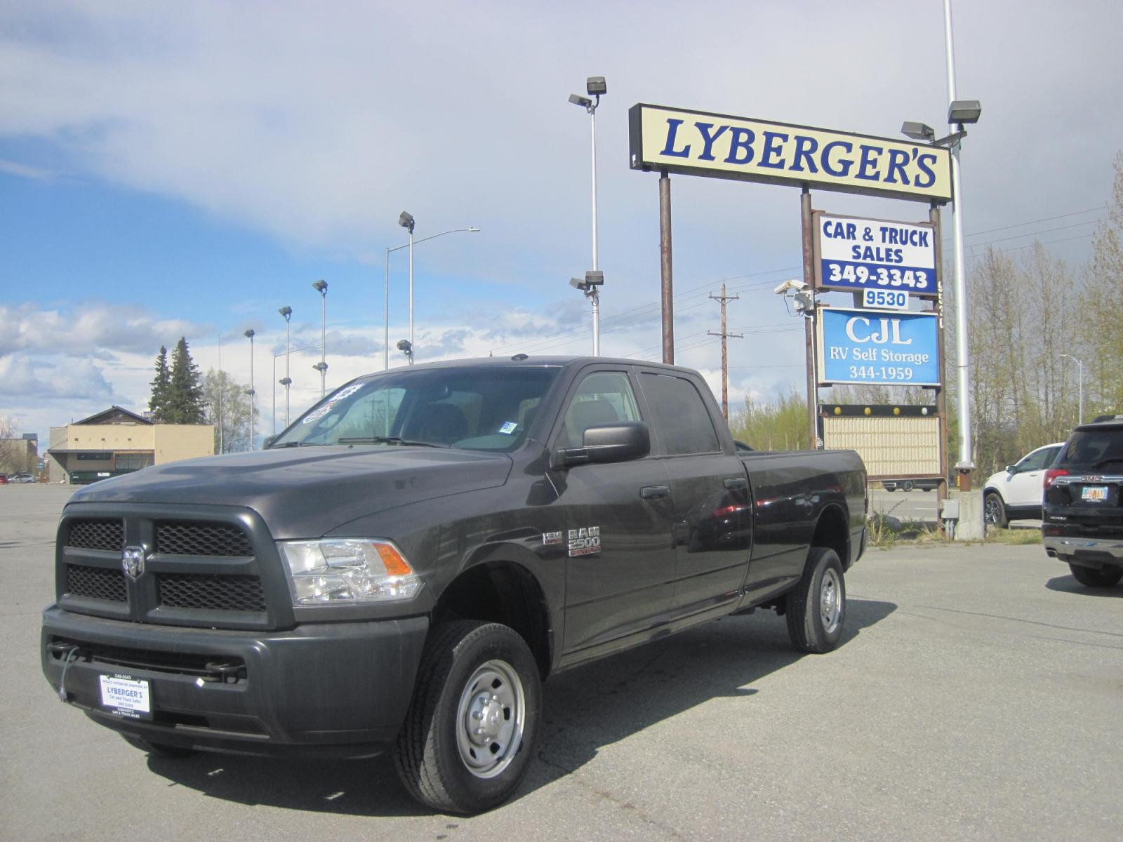 2016 gray /gray RAM 2500 Tradesman Crew Cab 4WD (3C6TR5HT6GG) with an 5.7L V8 OHV 16V engine, automatic transmission, located at 9530 Old Seward Highway, Anchorage, AK, 99515, (907) 349-3343, 61.134140, -149.865570 - Low miles on this ram 2500 come take test drive - Photo #1